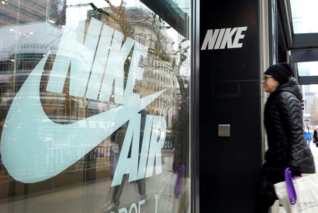 Higher costs dent Nike profits